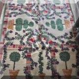 R37. Company C topiaries rug.